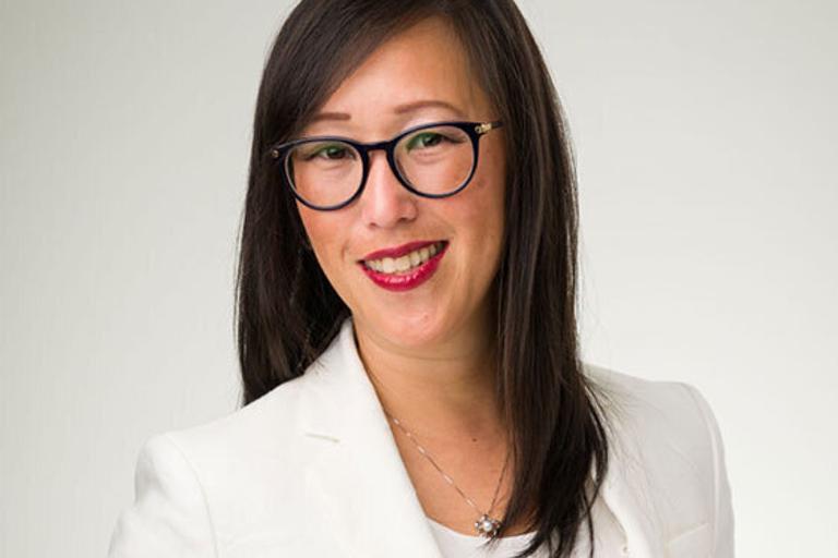 Portrait of Lilly Lin, leadership advisor at Russell Reynolds Associates