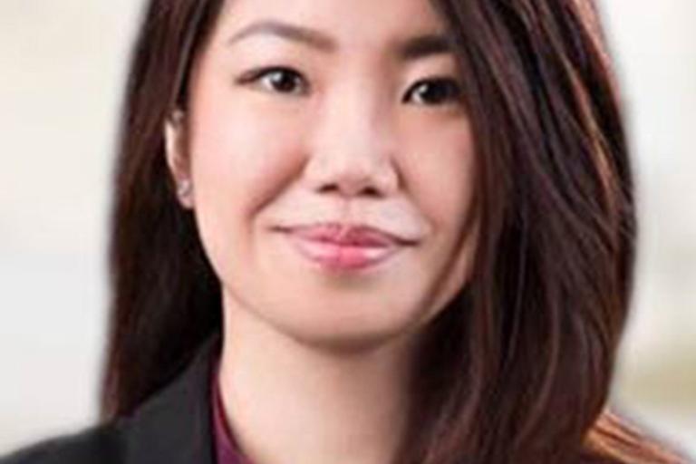 Portrait of Adelin Choy, leadership advisor at Russell Reynolds Associates